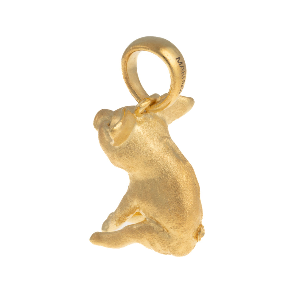 Gris, lille guldbelagt