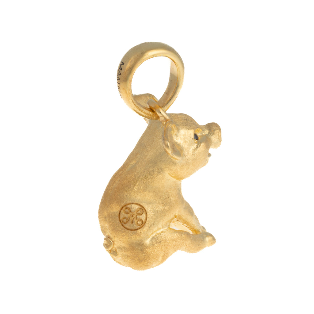 Gris, lille guldbelagt